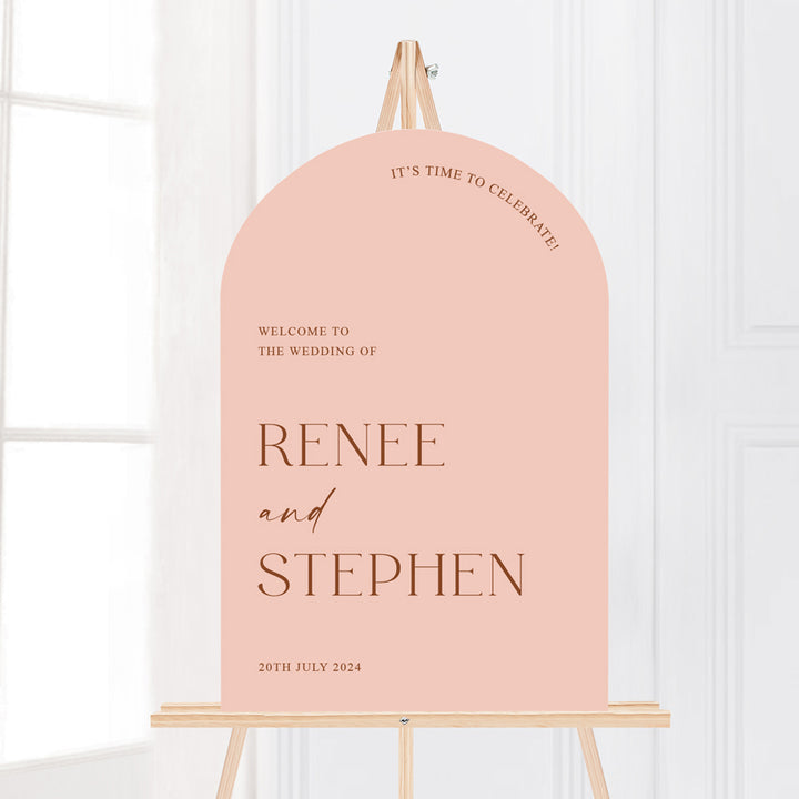 Modern minimal arch shape wedding welcome sign Australia in blush pink and terracotta colours. Printed in Australia.