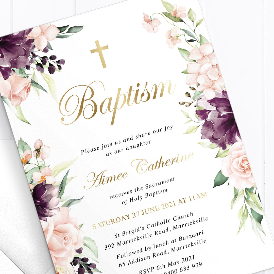 Gold foil baptism or christening invitation with soft pink and purple watercolour florals and decorative or catholic cross. Designed and printed in Australia.