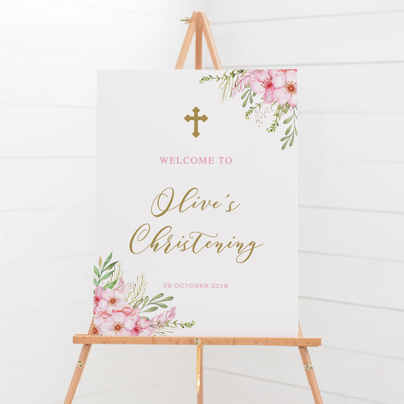 Baptism or Christening welcome sign features beautiful pink flowers and soft green leaves with modern calligraphy font