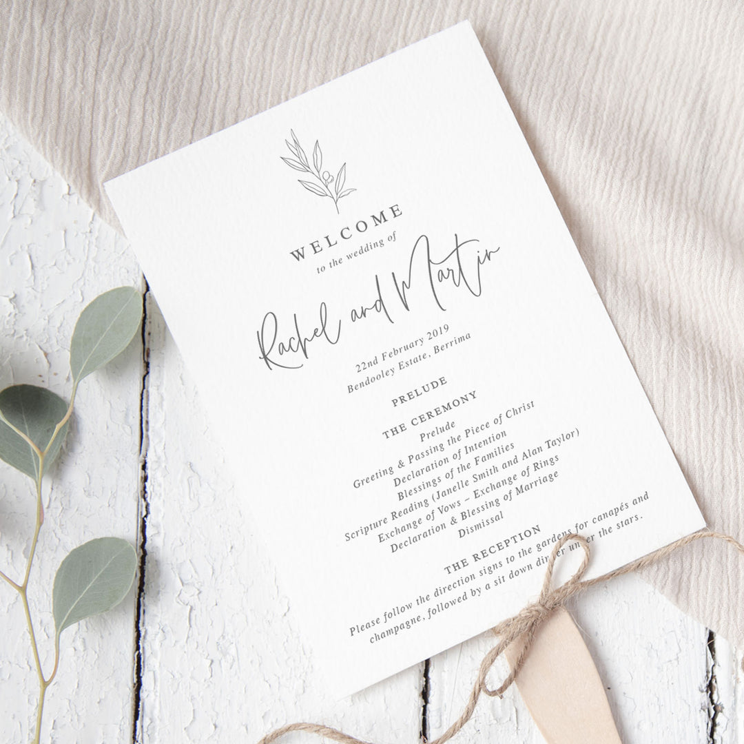 Wedding program in minimal style, grey and white with botanical hand drawn leaf and modern script font