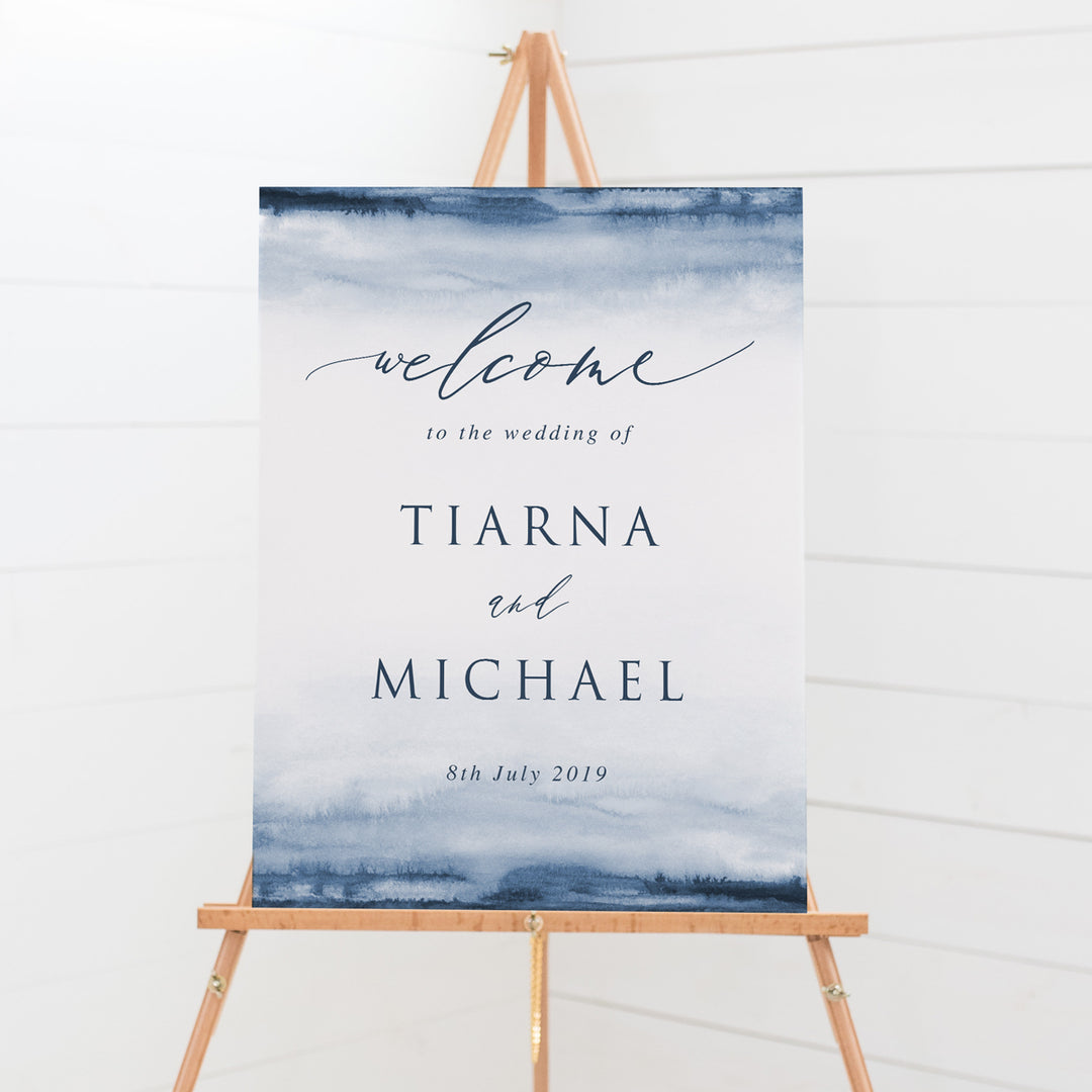 Wedding welcome sign with navy watercolour background and calligraphy font