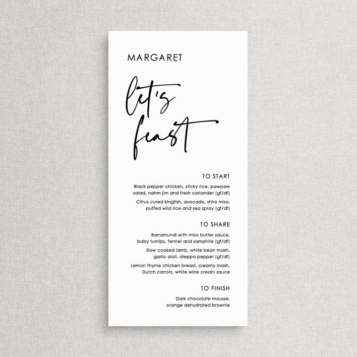 Modern wedding menu with Lets Feast for heading and guest name printing. Black and white menu card. Designed in Australia.