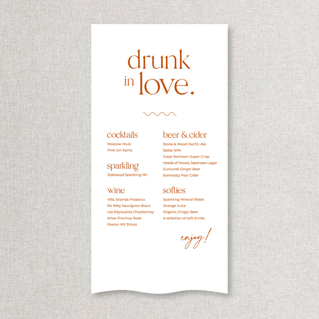 Modern wedding bar sign in burnt orange and white printed on linen or satin. Drunk in Love heading.