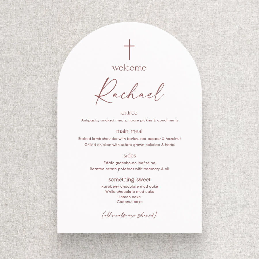Modern Baptism arch shape menu in dusky pink and white with cross at the top and guest name printing.