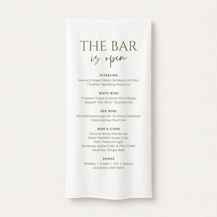 Fabric wedding bar sign printed in Australia on premium white linen or satin material. The Bar is Open heading in green.