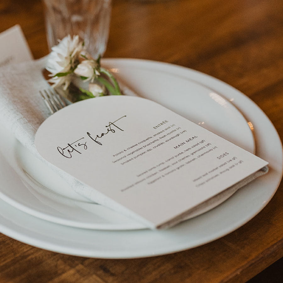 Billie arched wedding menu featuring clean typography and contemporary styling displayed on a place setting.