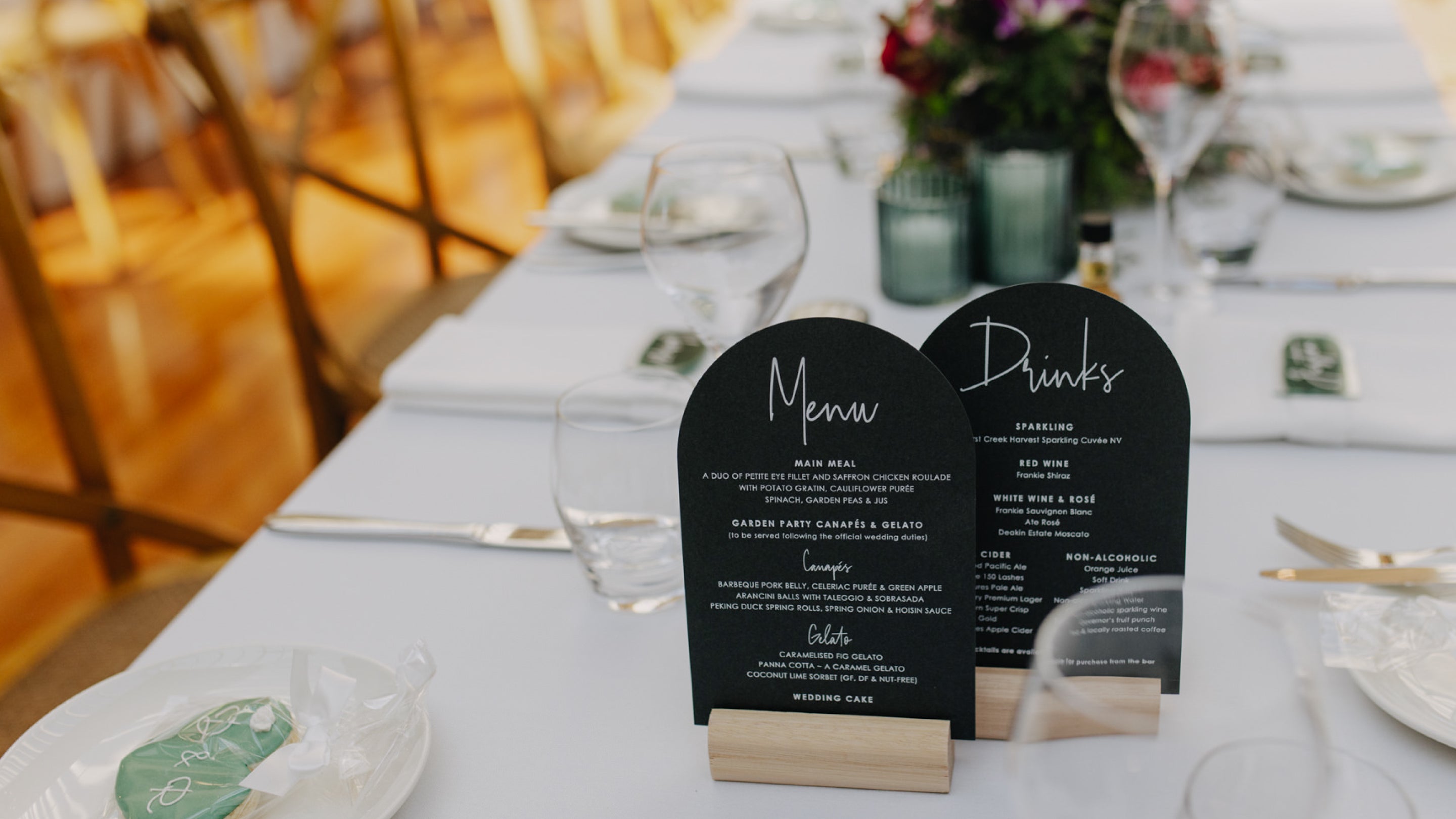 Wedding table menus and drinks menu in arch shape on deep green cardstock