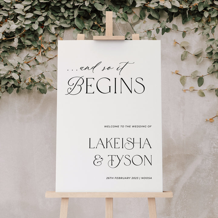 Wedding welcome sign. And so it begins. In black and white printed on signage board or acrylic Australia.