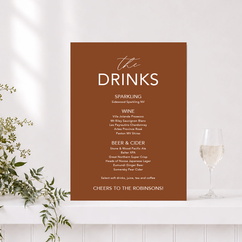 Wedding drinks sign in terracotta and white with "The Drinks" heading and list of alcoholic drinks, printed on foamboard or acrylic in Australia.