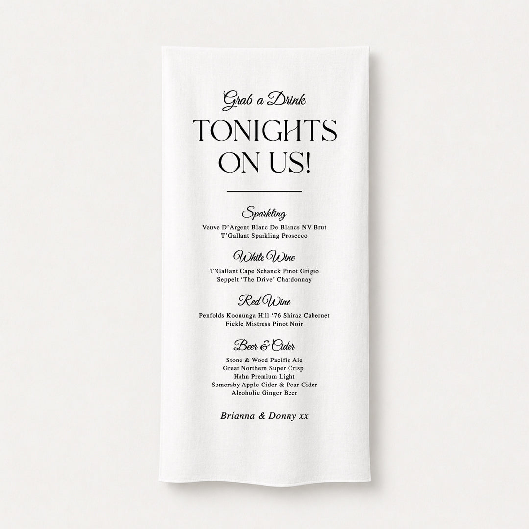 Elegant fabric wedding bar sign with timeless serif typography displaying a drinks menu, designed and printed in Australia. "Grab a Drink Tonights On Us".