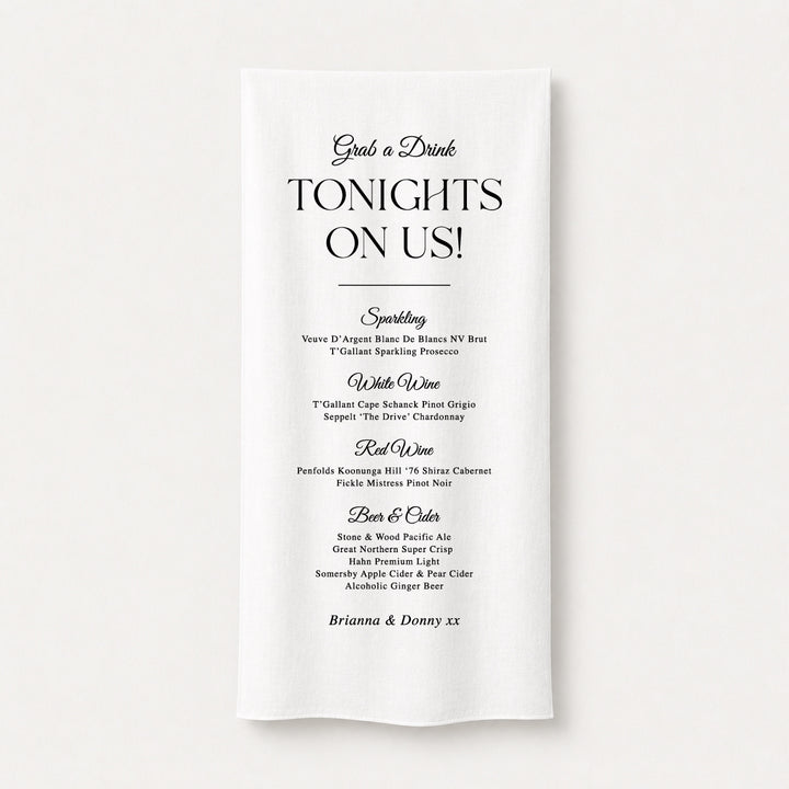 Elegant fabric wedding bar sign with timeless serif typography displaying a drinks menu, designed and printed in Australia. "Grab a Drink Tonights On Us".