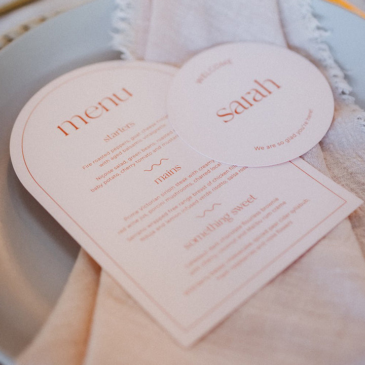 Wedding invitation sample pack. Blush and burnt orange menus with round place cards.Peach Perfect Stationery Australia.