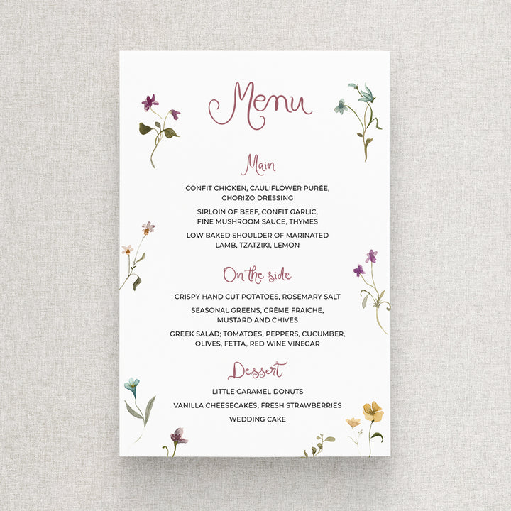 Beautiful wedding menu with handwritten font and delicate colourful wlidflowers. Designed and printed in australia.