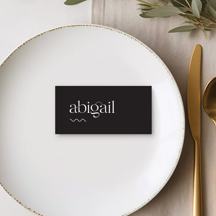 Modern flat rectangle wedding or event place cards or name tags. White and black.