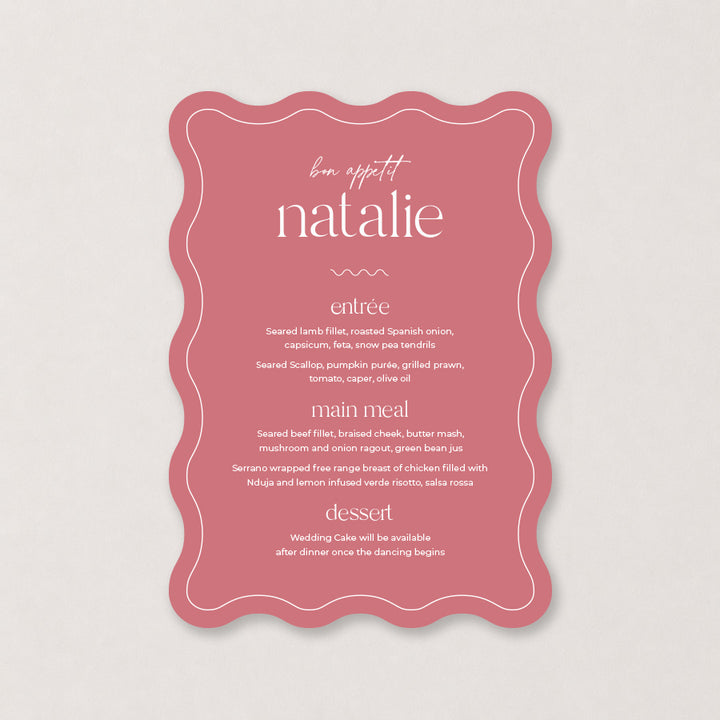 Pink wedding menu with decorative wavy edge and white typography