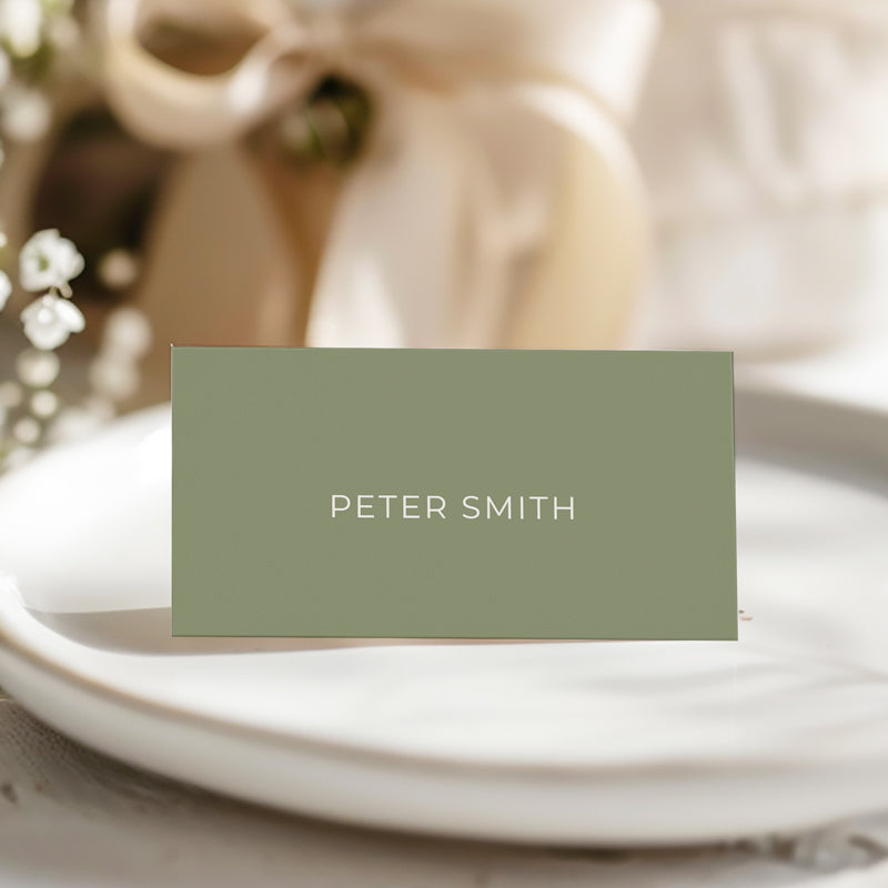 Folded wedding place cards or name cards in green and white with minimal font style. Peach Perfect Australia.
