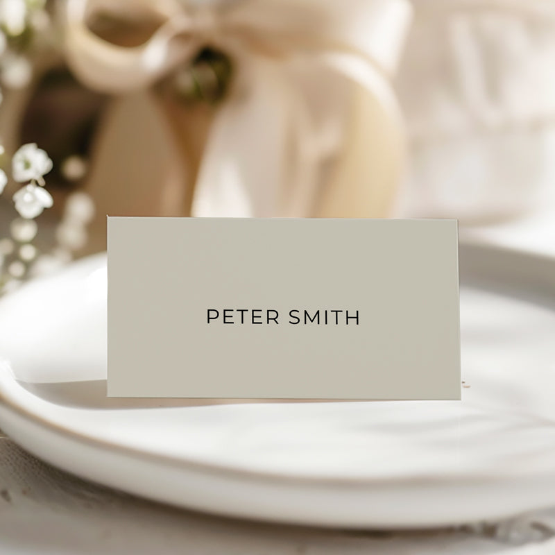 Folded wedding place cards or name cards in green and white with minimal font style. Peach Perfect Australia.