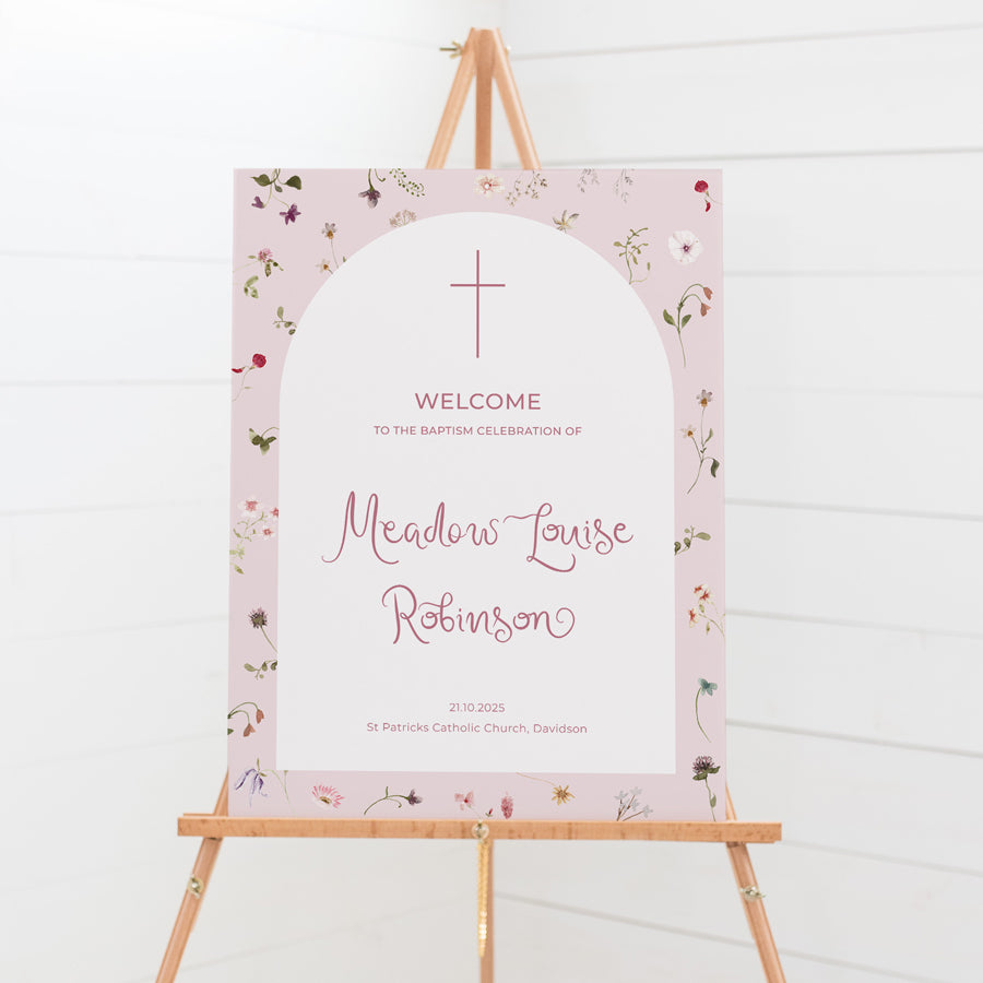 Wildflower arch Baptism welcome sign with an array of wildflowers and pink background.ting chart for guest allocations