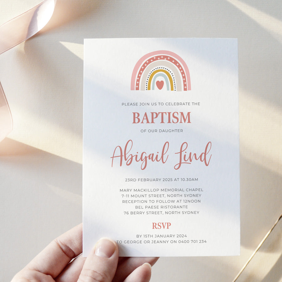 Little girl Baptism or Christening invitation with boho hand drawn rainbow and pink script font, designed in Australia