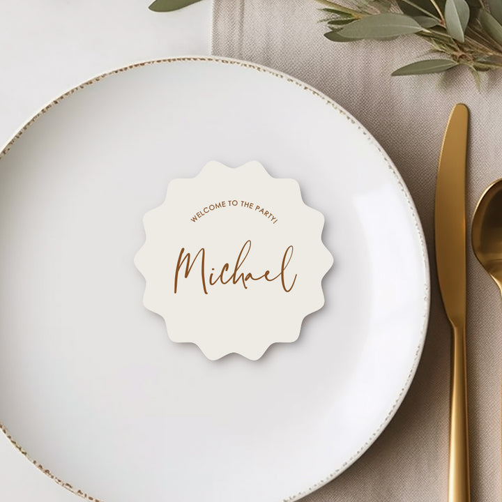 Fun and modern circle shape wedding place cards in ivory and burnt red with Welcome to the Party heading.
