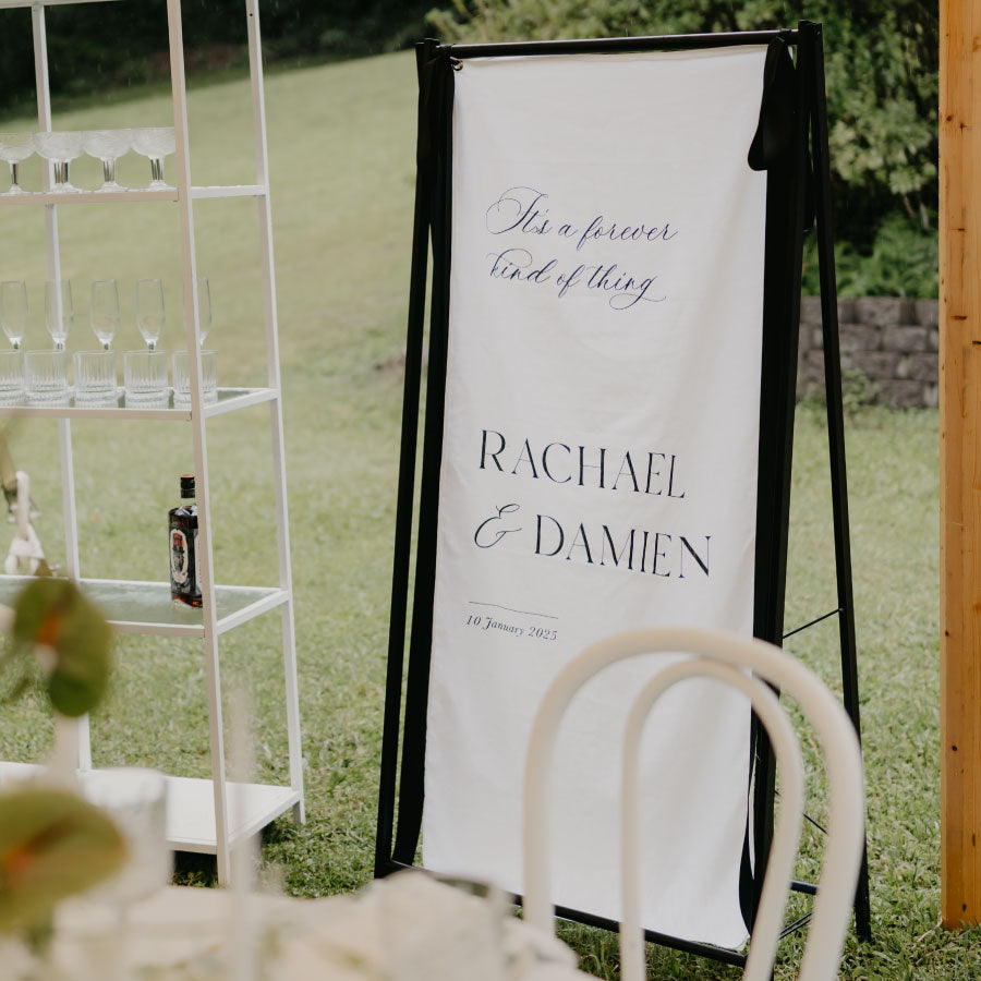 Black Wedding Sign Stand Hire for linen fabric signage Sunshine Coast and Brisbane