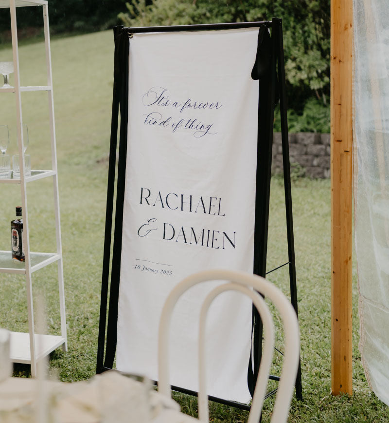 Black Wedding Sign Stand Hire for linen fabric signage Sunshine Coast and Brisbane