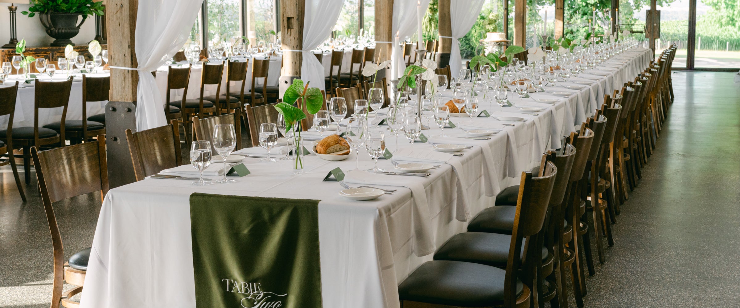 Beautiful green and white weddin gtable with place cards Australia