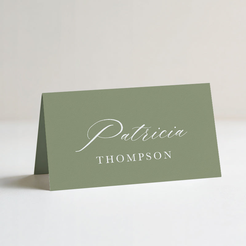 Folded wedding place cards or name cards with romantic calligraphy font in green and white. Printed in Australia.