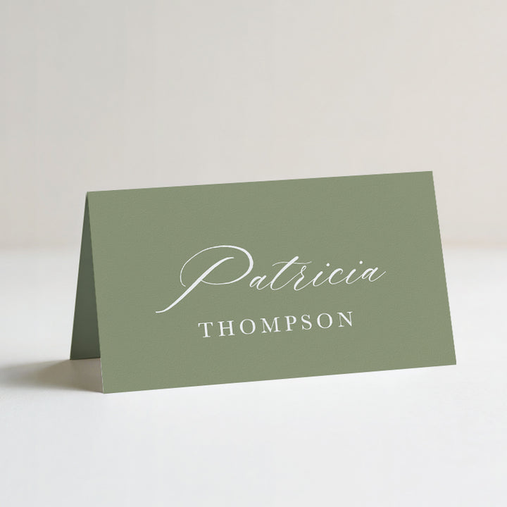 Folded wedding place cards or name cards with romantic calligraphy font in green and white. Printed in Australia.