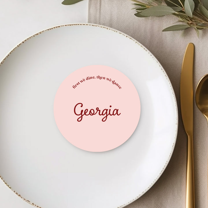 Round circle shape wedding place card printed in Australia on premium pink cardstock. First we dine then we dance