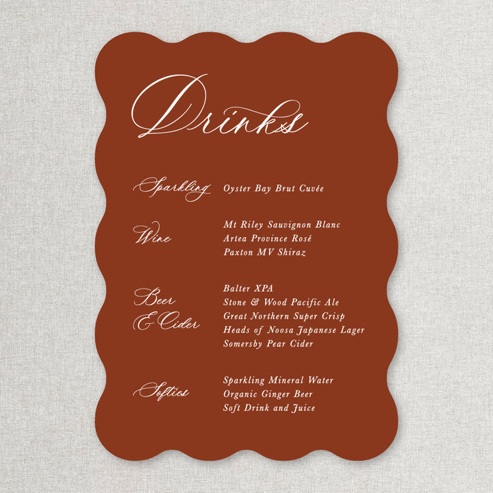 Wavy shape calligraphy wedding drinks or bar sign in terracotta red and white. Designed and printed in Australia.