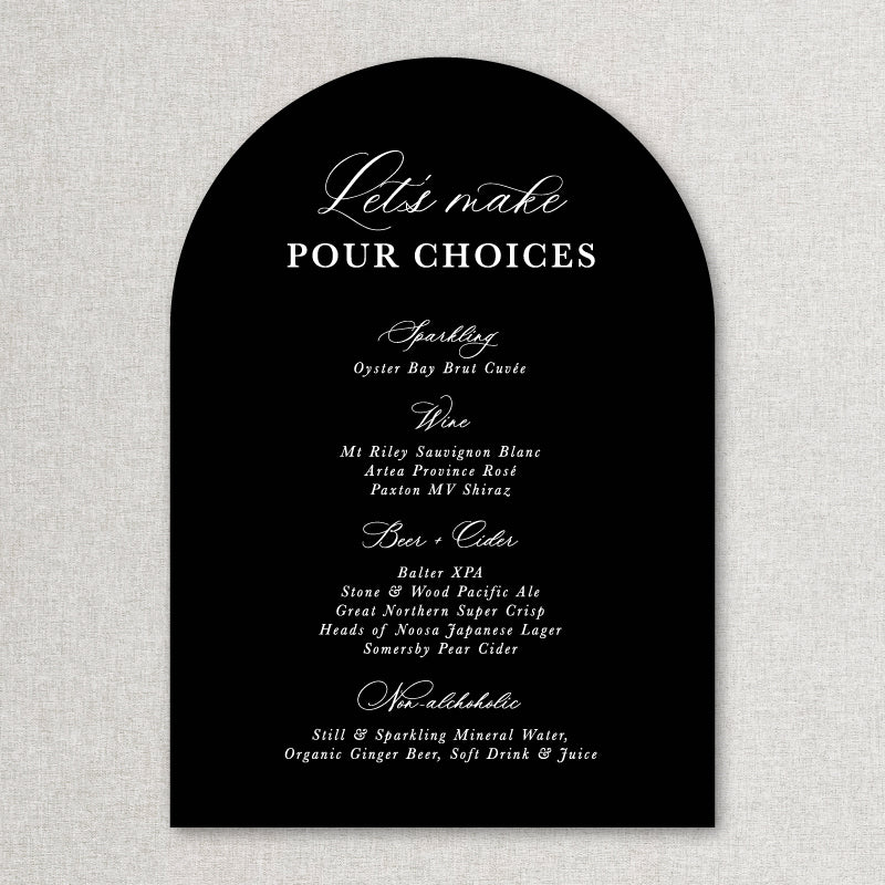 Calligraphy arch shape wedding bar sign in black and white with lets make pour choices heading. Printed in Australia.