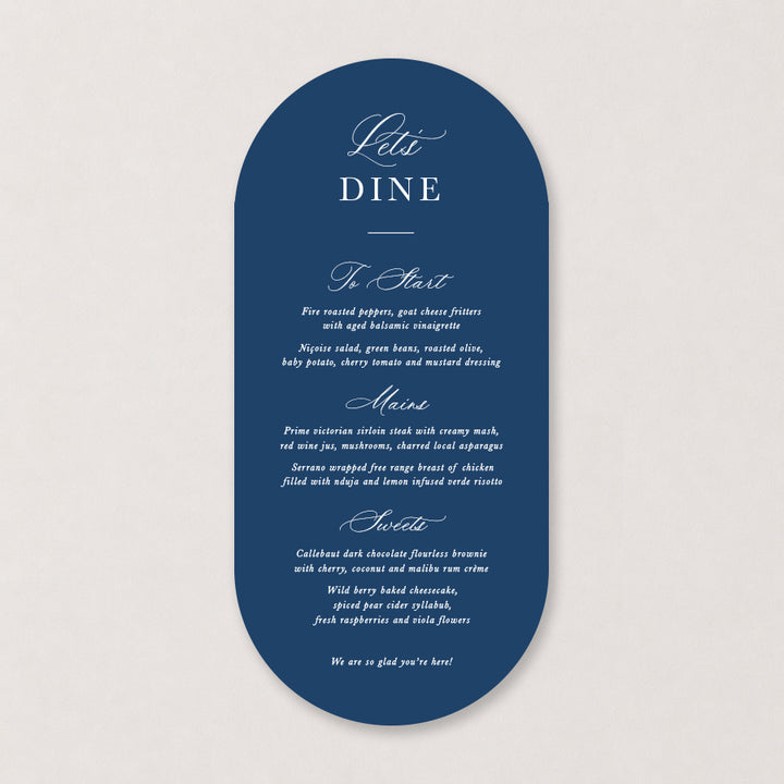 Navy blue wedding menu with elegant white calligraphy and curved die-cut shape