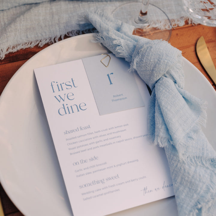 Modern pastel blue and white wedding menu in with matching place cards and gold paperclip. Printed in Australia by Peach Perfect.

