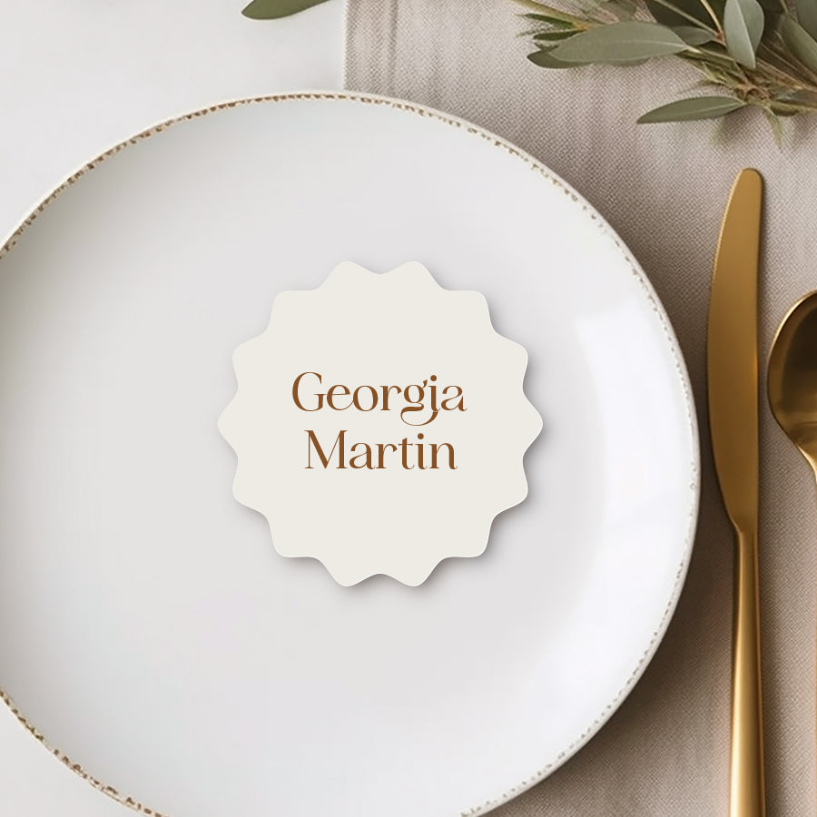 Wavy round shape coaster style wedding place cards with modern typography in terracotta and white. Peach Perfect Australia.