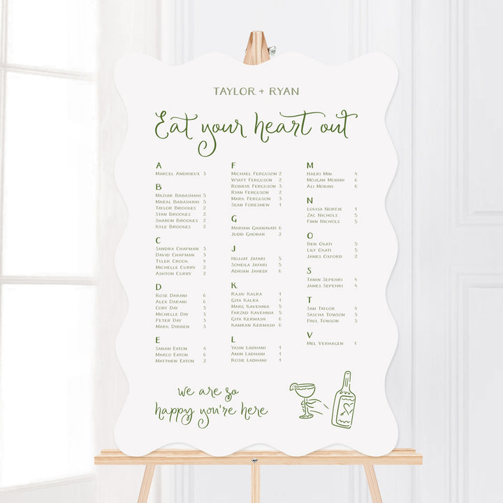 Whimsical wedding seating chart with hand drawn illustrated design elements in green. Peach Perfect Australia.