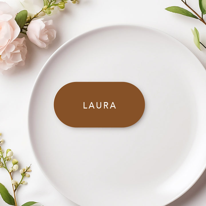 Terracotta wedding place cards with white ink in round shape, design and printed in Australia.