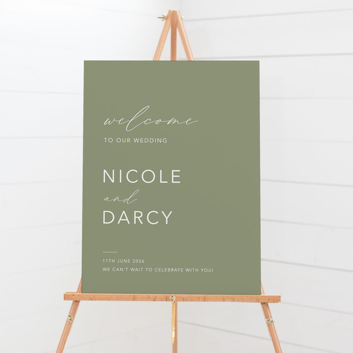 Wedding welcome sign on an easel with a green background and white text. Printed in Australia.
