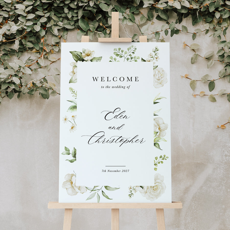 Wedding welcome sign printed in Australia with white flowers, leafy border and calligraphy. Peach Perfect.