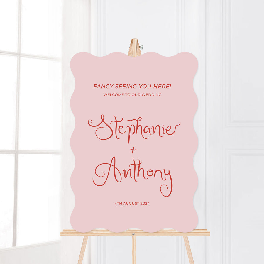 Modern wavy edge wedding welcome sign with quirky hand written font style in beautiful pink and burnt red orange. Printed in Australia on foam board or acrylc.
