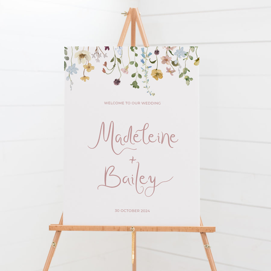 Wildflower wedding welcome sign with florals and hand written script font in pink. Print on foamboard or acrylic in Australia.