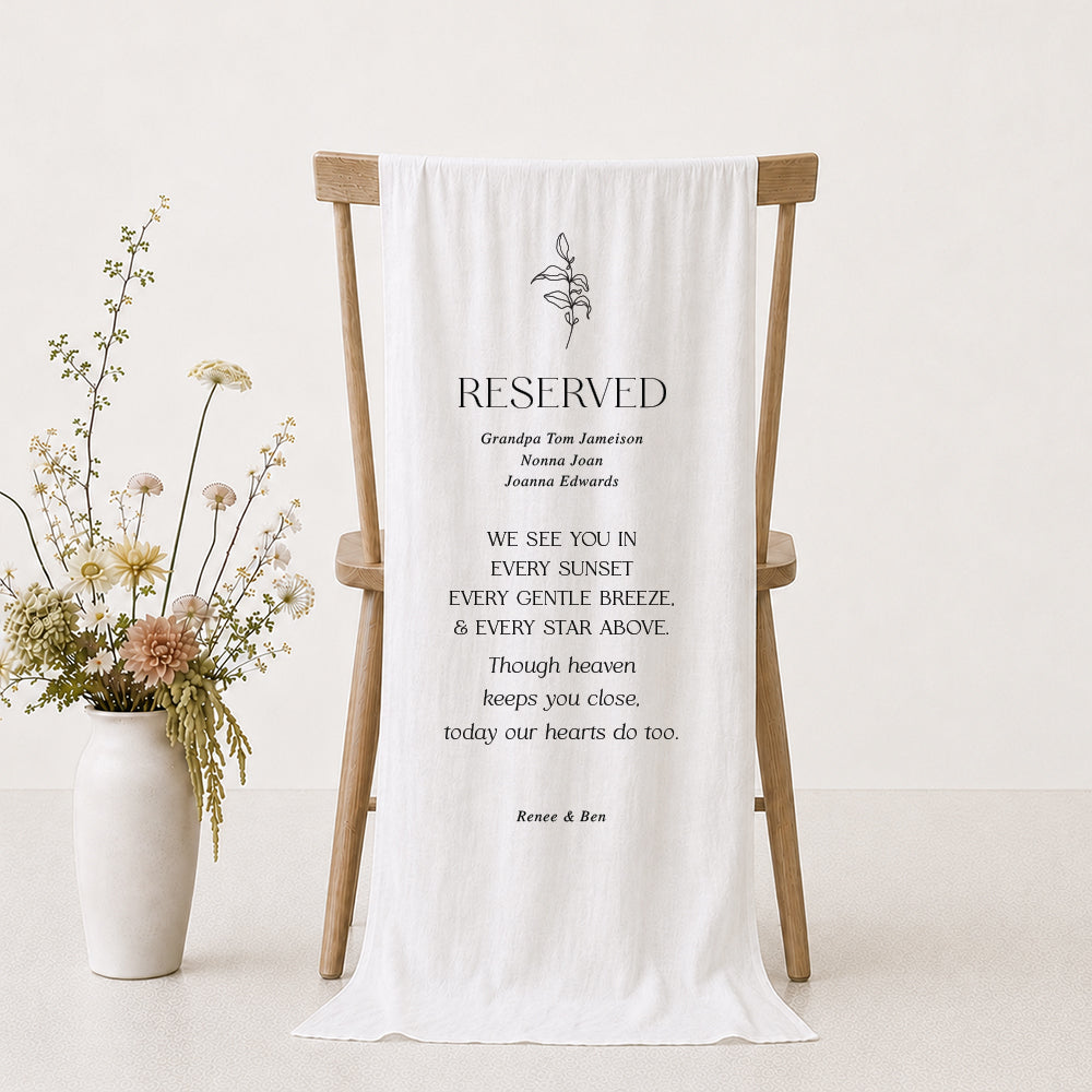 Reserved in loving memory wedding sign printed on white linen fabric with botanical hand drawn element