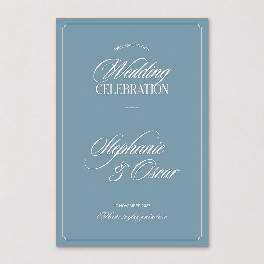 Rosamont old money wedding welcome sign in dusty blue with border and traditional calligraphy