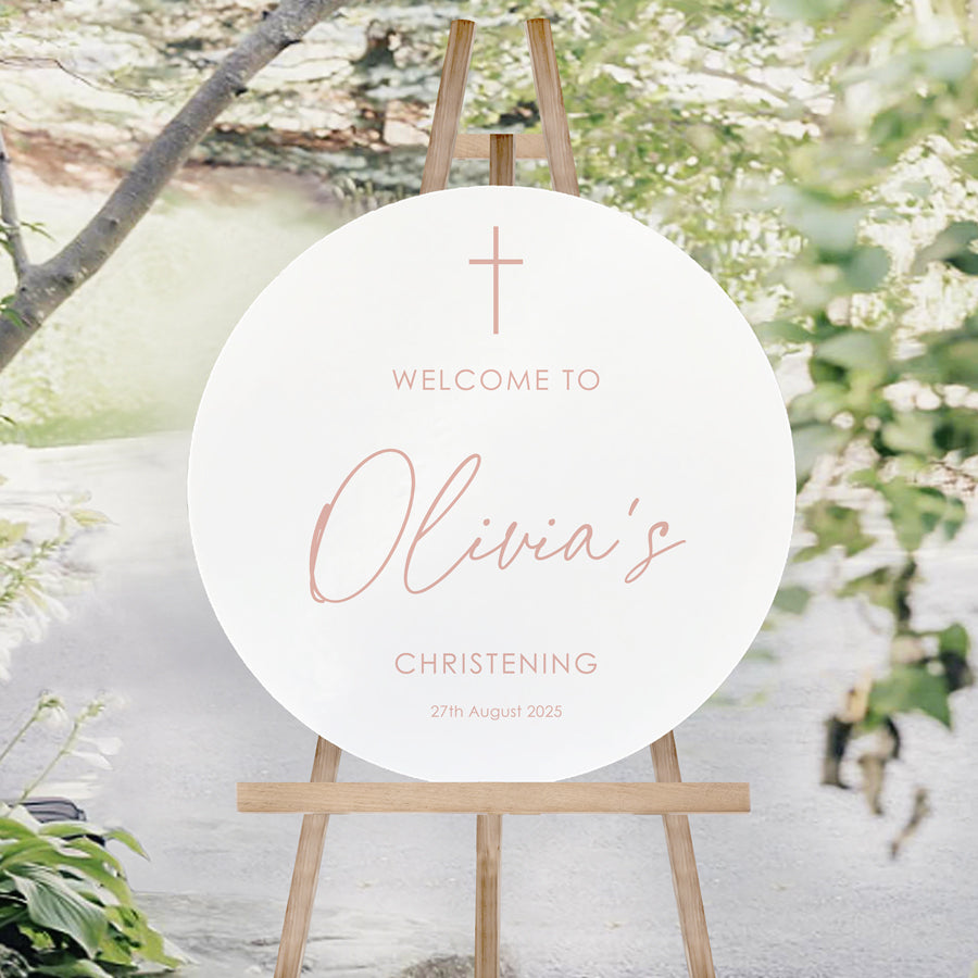 Baptism or Christening welcome sign in soft pink and white in round shape. Printed in Australia.