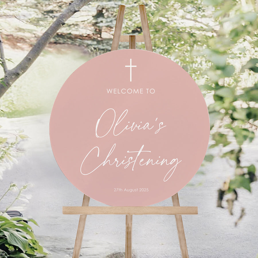 Baptism or Christening welcome sign in soft pink and white in round shape. Printed in Australia.