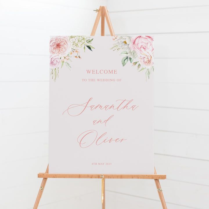 Pink floral wedding welcome sign with roses and green leaves. Designed and printed in Australia