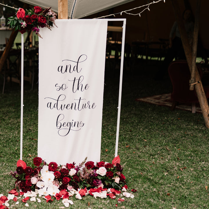 Linen wedding welcome sign 'and so the adventure begins' personalised with your wording