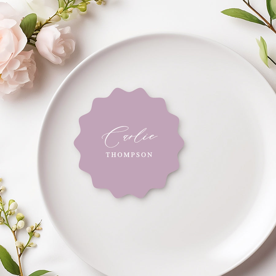 Wavy die cut round mauve and white shape calligraphy wedding place cards with first and last guest names, printed in Australia.