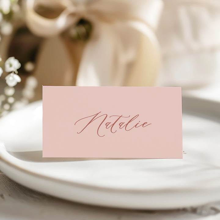 Folded calligraphy wedding place cards or name cards in pink. Peach Perfect Australia.