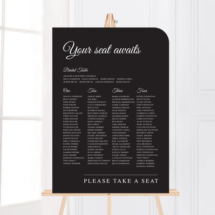 Wedding welcome sign on an easel printed on foamboard or acrylic inbnlack and white. Timeless calligraphy style.
